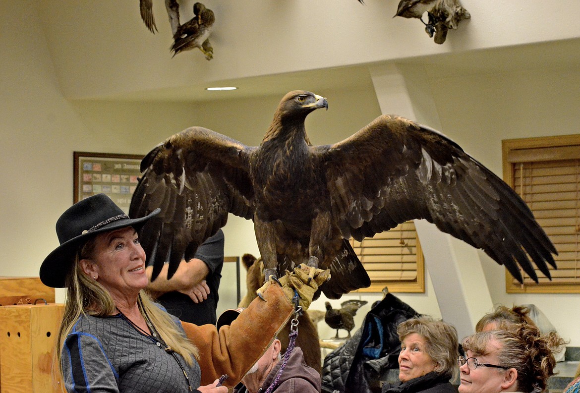 Janie Veltkamp with &#147;Dakota,&#148; the magnificent golden eagle.