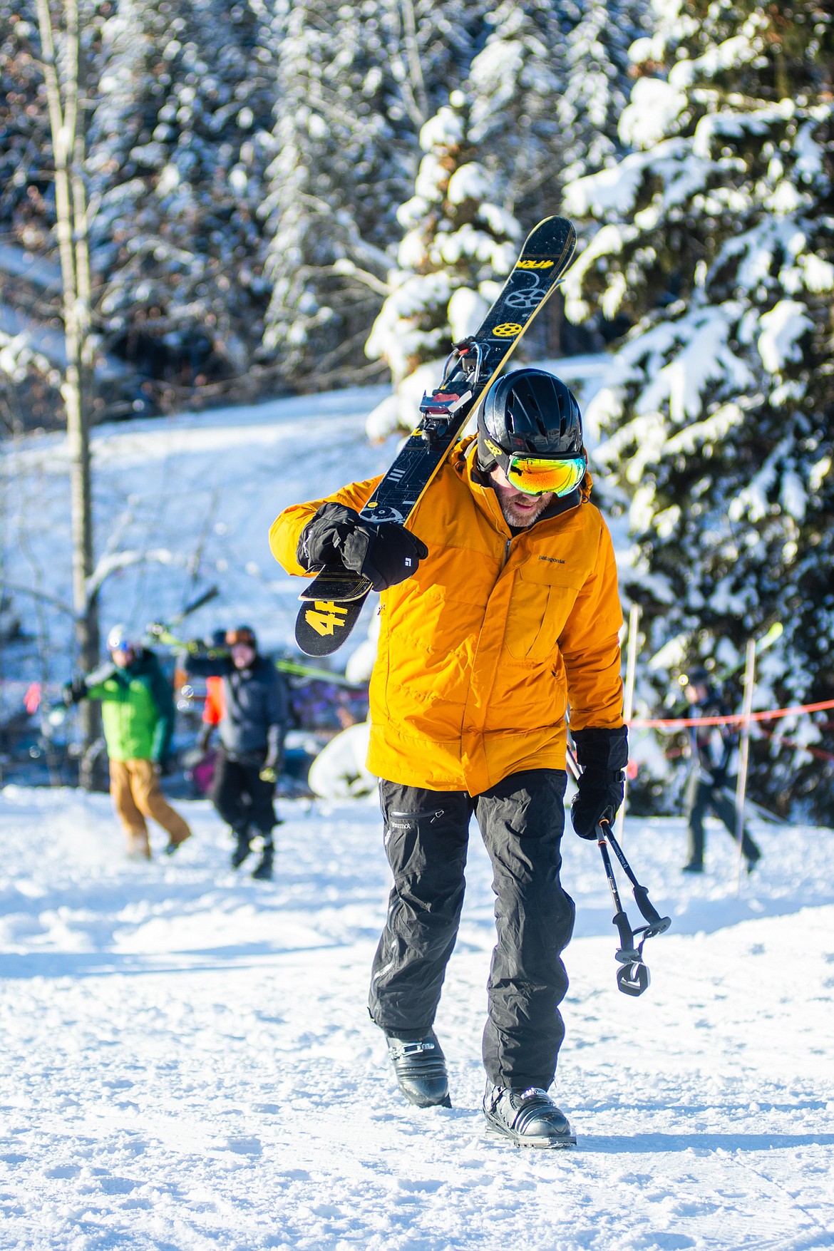 Skiers hike up to Chair 1 for opening day at Whitefish Mountain Resort.