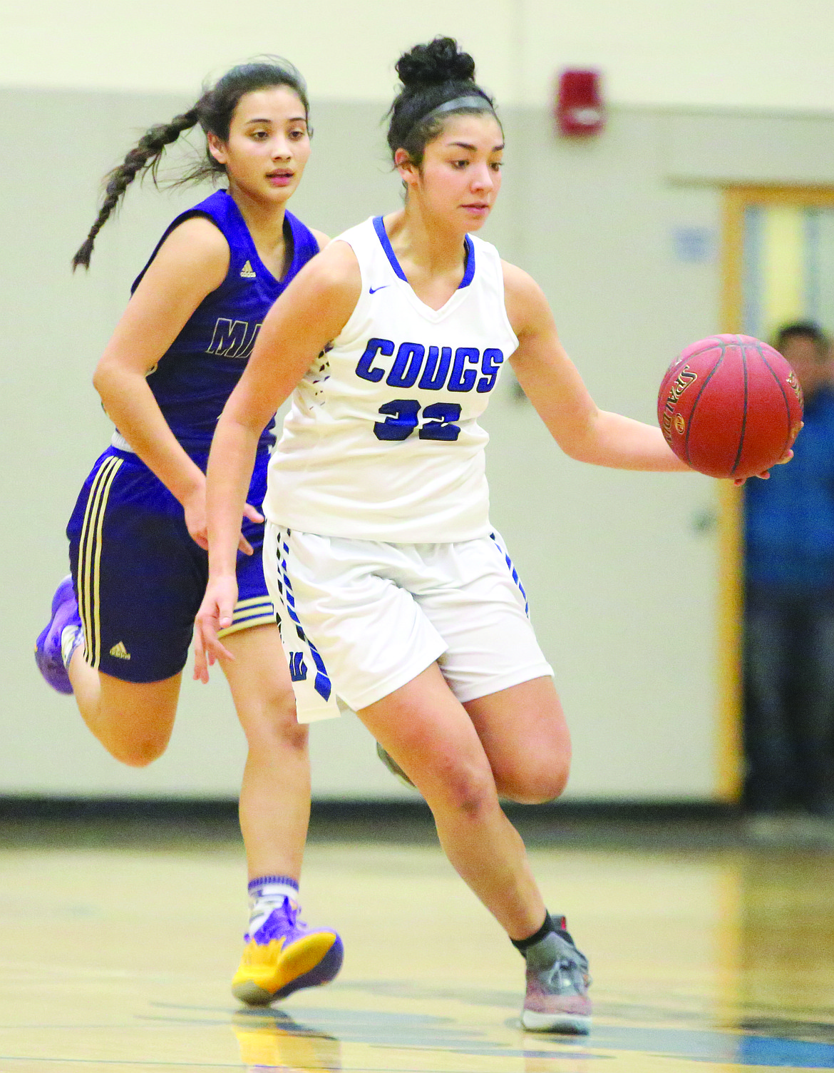 Connor Vanderweyst/Columbia Basin Herald
Warden's Kiana Rios handles the ball up court against Mabton.