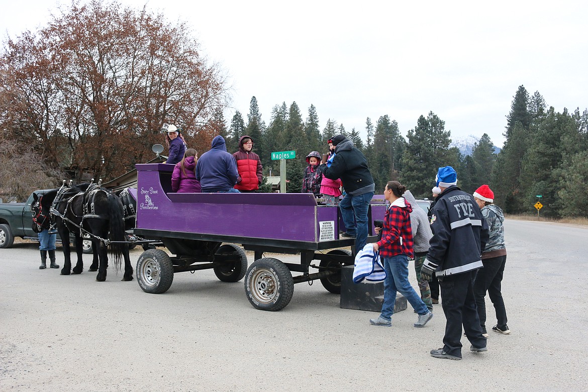 Photo by MANDI BATEMAN
Paula Sandelin gave wagon rides with her team of Percherons.