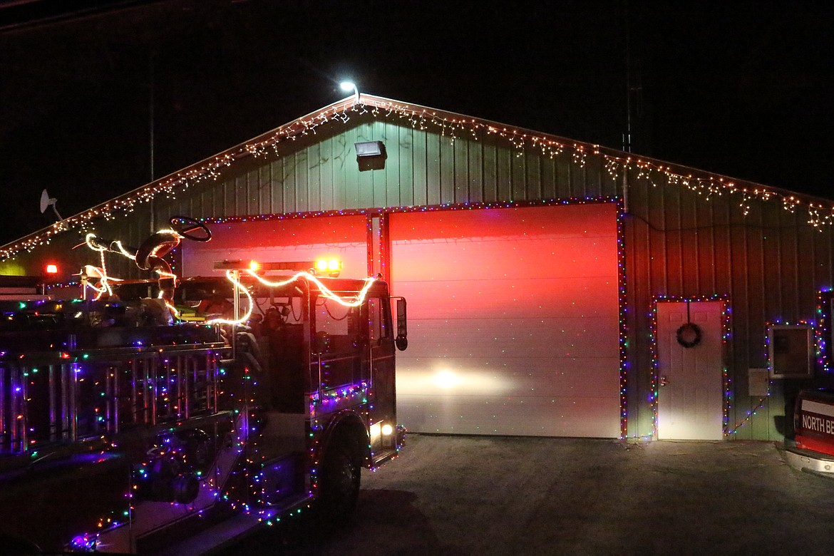 Photo by MANDI BATEMAN
Christmas comes to North Bench Fire station during Santa&#146;s Chariots of Fire tour.