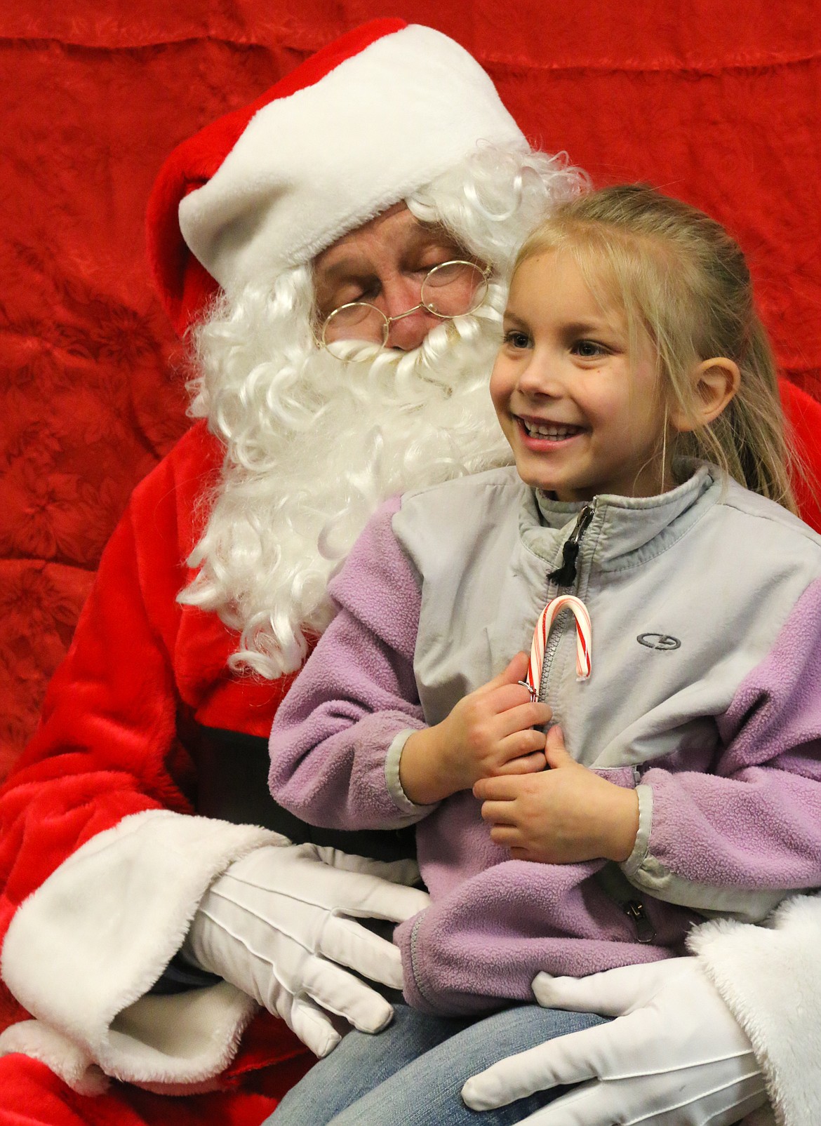 Photo by MANDI BATEMAN
The tour brought Santa to children who may not have had a chance to see him during the Naples Holiday Festival.