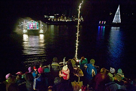 A Coeur d&#146;Alene Resort cruise ship approaches its destination, where Santa awaits, on a Journey to the North Pole. (JEROME POLLOS/Press file)