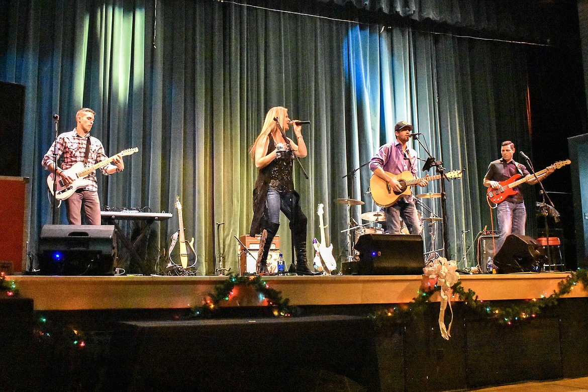 Jacque Jolene performs with Chance Long and the Last Chance Band during the annual Festival of Trees Fundraising Gala. (Ben Kibbey/The Western News)