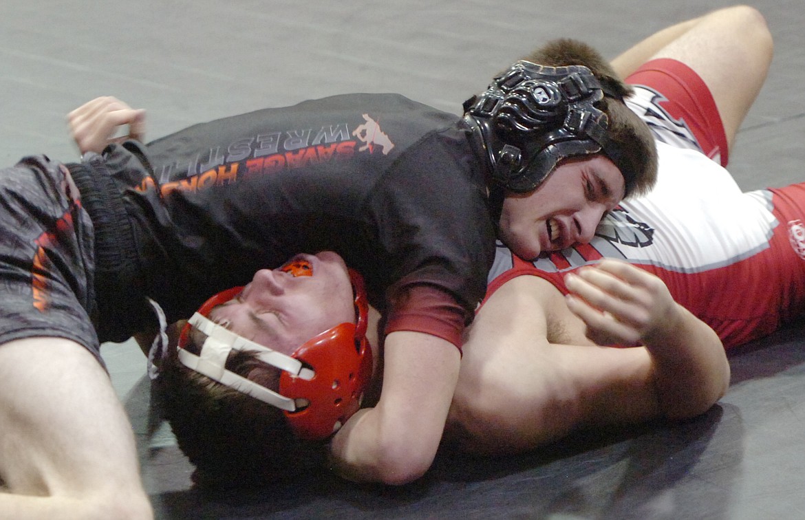 Conrad Vanderwall of Plains/Hot Springs prepares to pin Arlee&#146;s Colt Crawford during a 132-pound match at the Plains/Hot Springs quad meet last Thursday at Hot Springs. Vanderwall placed second in the Bob Kinney Classic on Saturday in Superior. (Joe Sova/Clark Fork Valley Press)