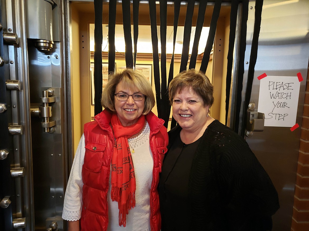 Photo by KERI ALEXANDER
Melba Bencich and Peggy White grab a picture together during the Dave Smith Christmas Fund Telethon. Bencich donated a lot of time working the phones for donations.