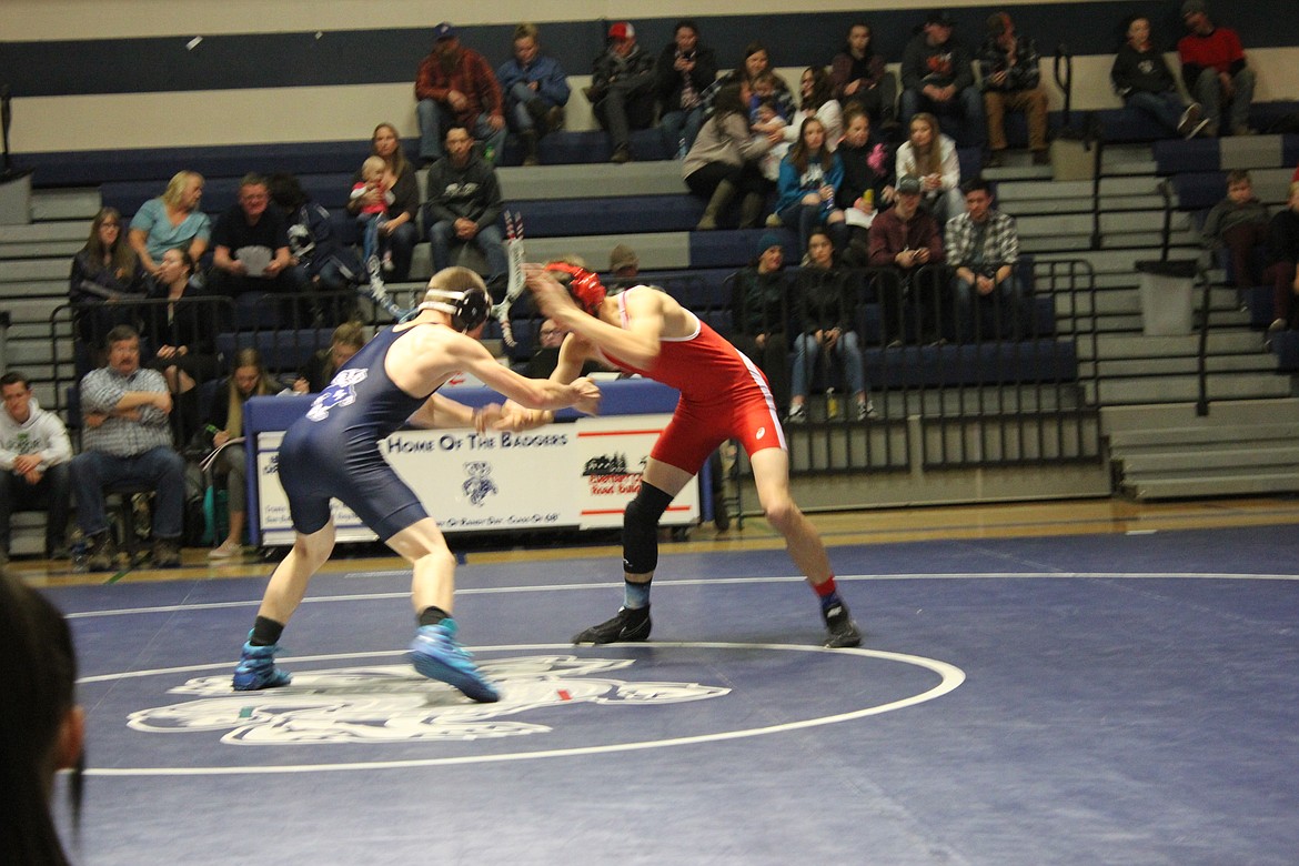 Bonners Ferry wrestlers battle Sandpoint during their Dec. 4 dual meet.