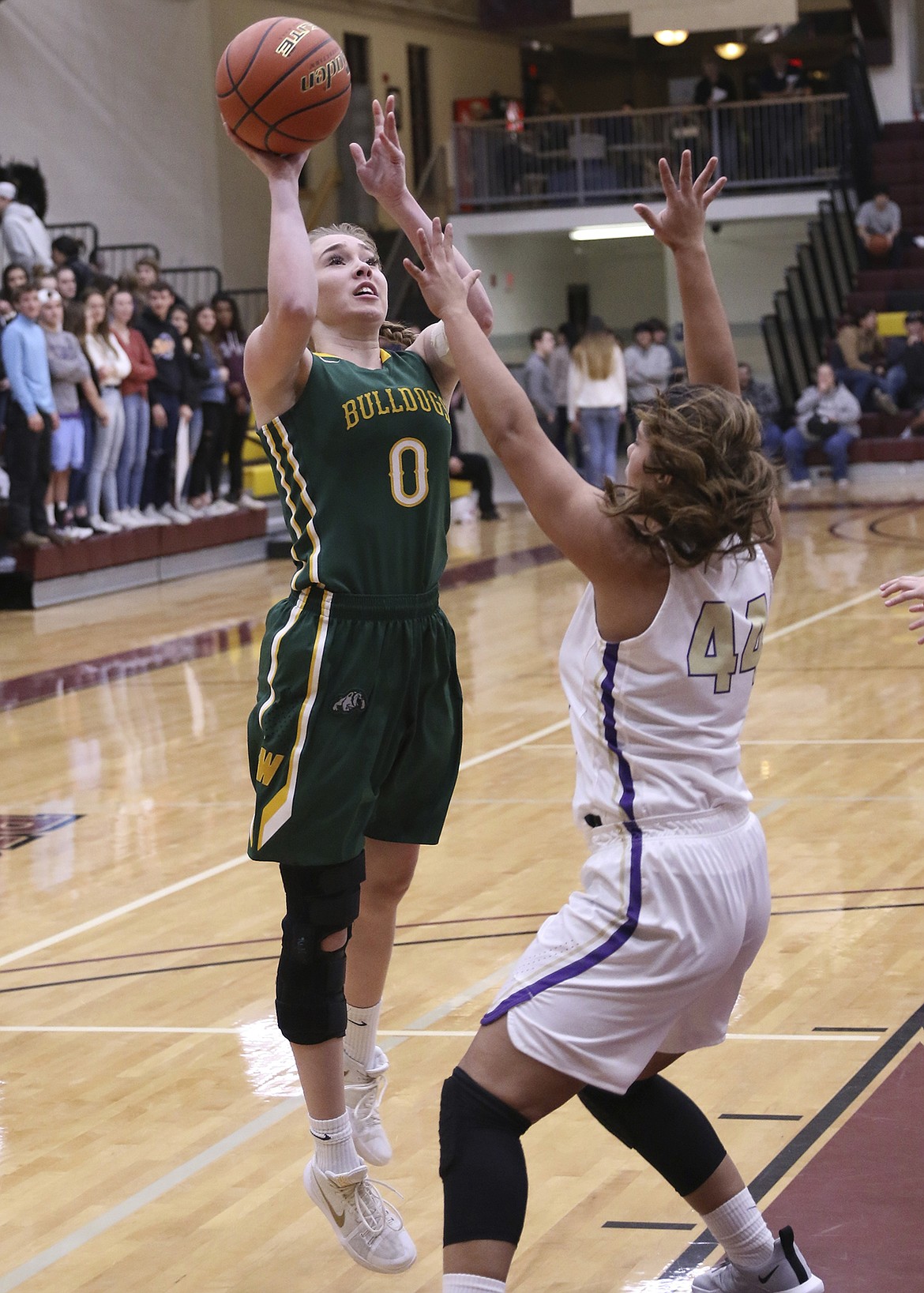 Kit Anderson rises for a shot against the Lady Pirates last Tuesday. (Bob Gunderson photo)