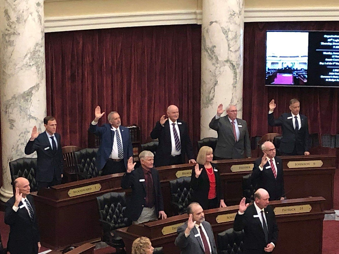 (Courtesy photo)
Newly elected Idaho Senator Jim Woodward is pictured, top left, during the swearing in ceremony of the Idaho State Senate on Dec. 6.