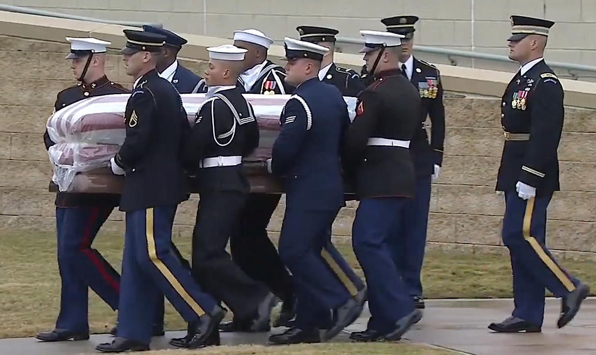 U.S. Navy seaman Anthony Byrns of Hot Springs, second from left on the near side, was one of eight ceremonial honor guards who carried President George H.W. Bush&#146;s casket to the presidential library on the Texas A&amp;M campus in College Station, Texas, for burial on Thursday, Dec. 6. (Courtesy photo)