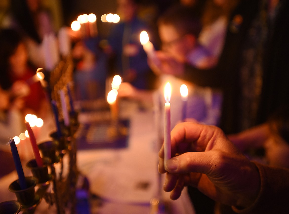 Jewish families from around the Flathead gather to celebrate Hanukkah on Saturday, Dec. 8, in Kalispell. Hanukkah is known as the Festival of Lights, which commemorates a miracle that happened in the Temple in Jerusalem.