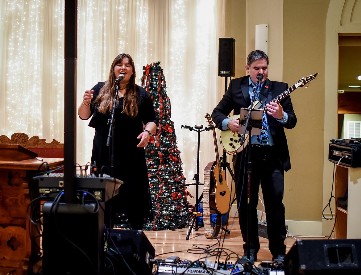 Photo by JORDAN LEWIS
Bridgette Lewis, 28, and her dad, Michael Lewis, perform in the Jacklin Arts and Cultural Center on Thursday evening. The daddy-daughter duo make up the band One Street Over. They have been performing together since Bridgette was 13.