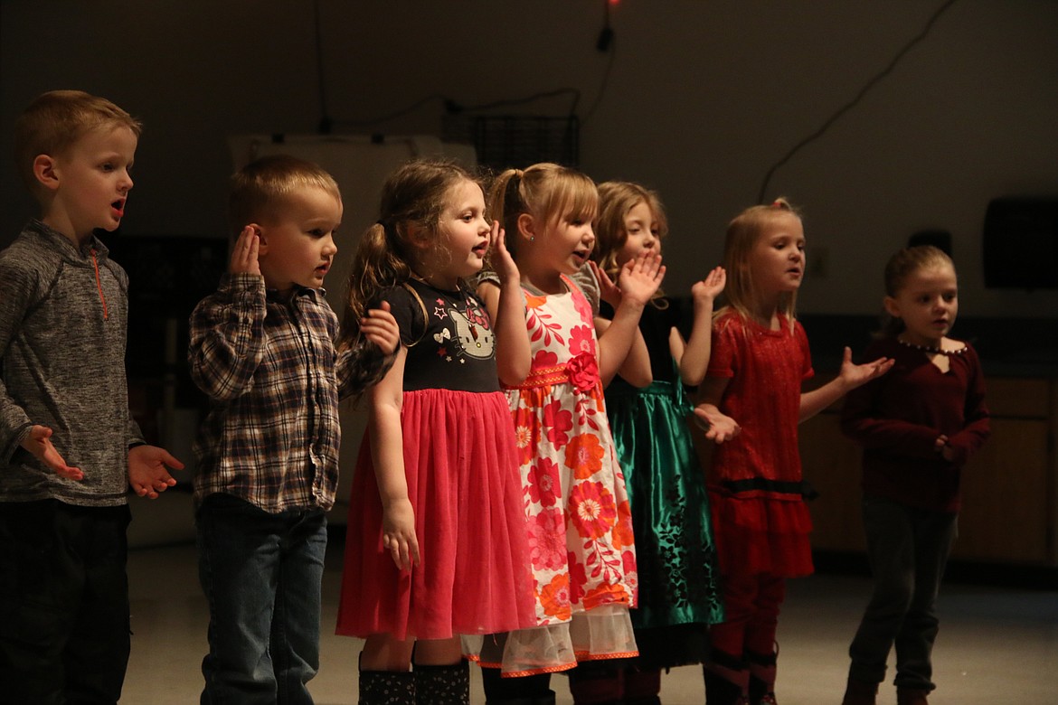 Idaho Hill Elementary kindergartners sang &#147;Up on the Housetop&#148; during the school&#146;s winter music program on Dec. 12.

(Photo by 
MARY MALONE)