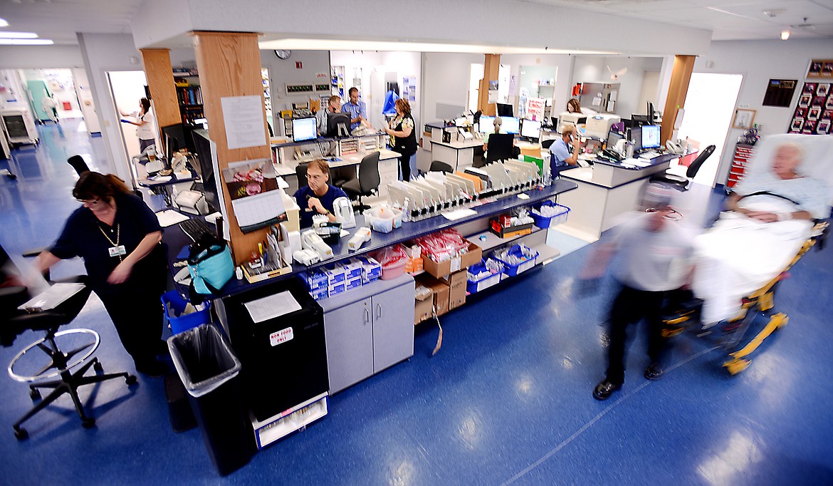 A patient is wheeled through the Emergency Room at the Kalispell Regional Medical Center on Thursday, July 31, 2014.(Brenda Ahearn/Daily Inter Lake)