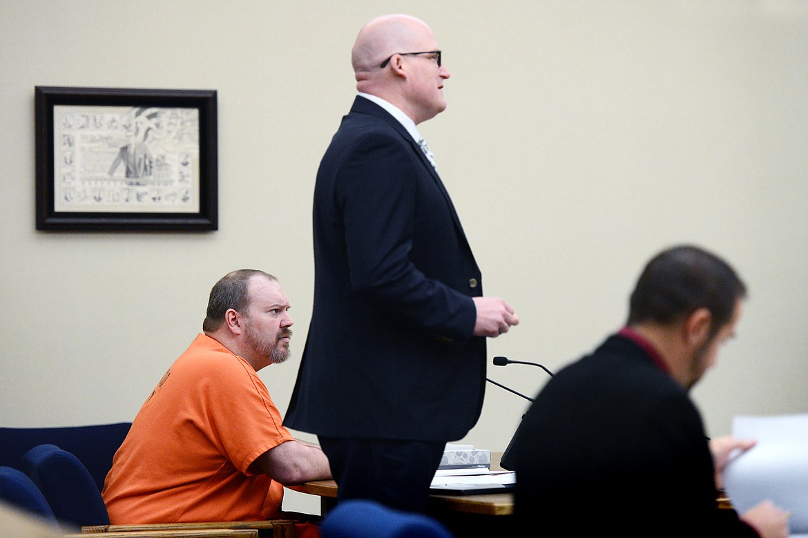 James William Quen looks on as his attorney Brian Carl Smith, center, speaks with Judge Heidi J. Ulbricht during a plea agreement hearing in Flathead District Court on Friday. Quen has been jailed since April 26 for allegedly shooting Bradley Allen Winters, 33, from Hungry Horse, during a late-night argument April 25. At right is county attorney Travis Ahner.  (Casey Kreider/Daily Inter Lake)