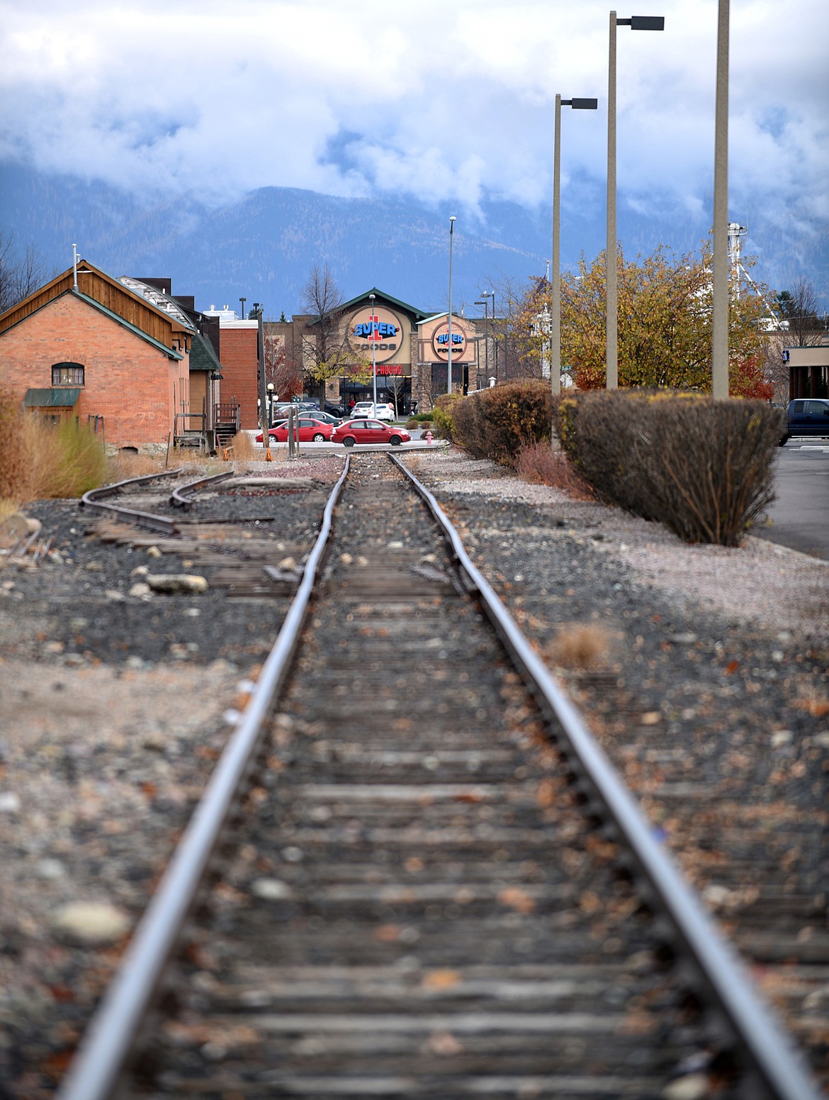 View of the railroad tracks running through downtown Kalispell. Once the tracks are removed, the city aims to redevelop the area through its Core Area development plan.
(Brenda Ahearn/Daily Inter Lake)