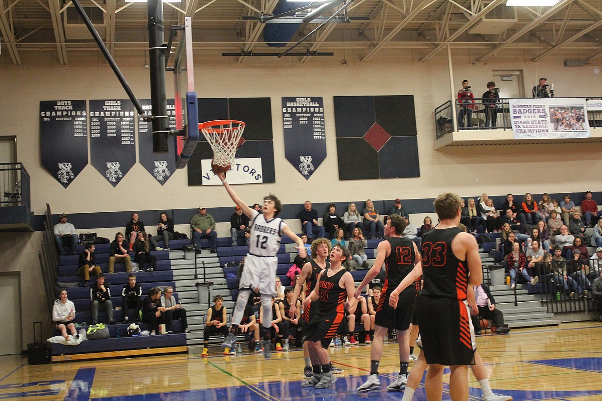 Photo by TANNA YEOUMANS
Dylan Hittle jumping high as he scores.