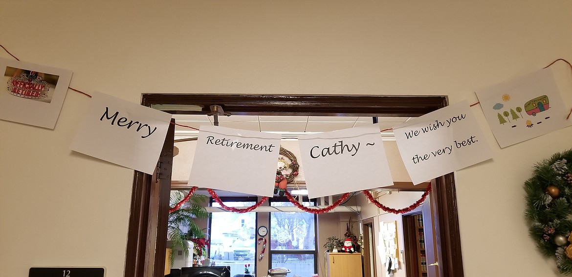 Photo by MANDI BATEMANA sign welcomed people to the Boundary County Prosecutor&#146;s Office for Cathy Well&#146;s retirement.