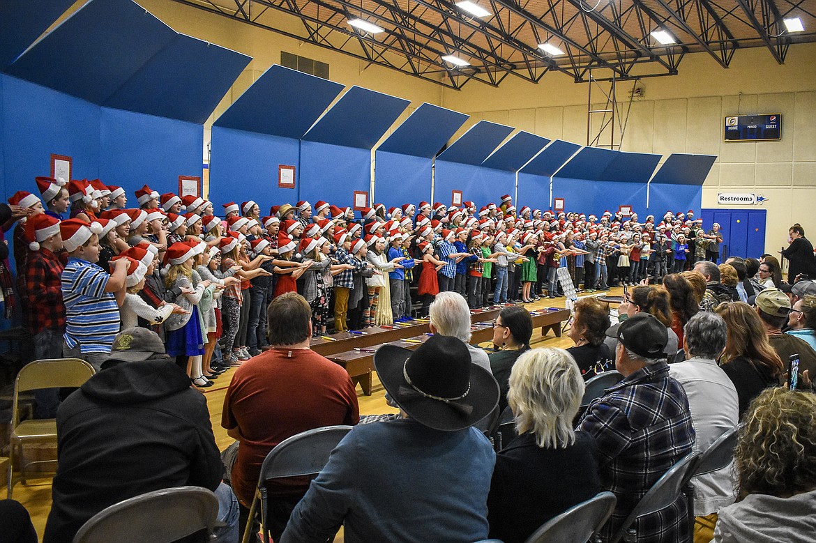 Libby 4th and 5th grade students perform during their Christmas concert at the Libby Elementary School Gym Thursday. (Ben Kibbey/The Western News)