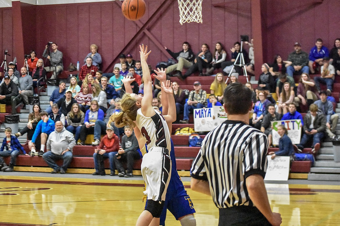 Troy senior Annie Day goes in for a layup early in the fourth quarter against Thompson Falls Friday. (Ben Kibbey/The Western News)