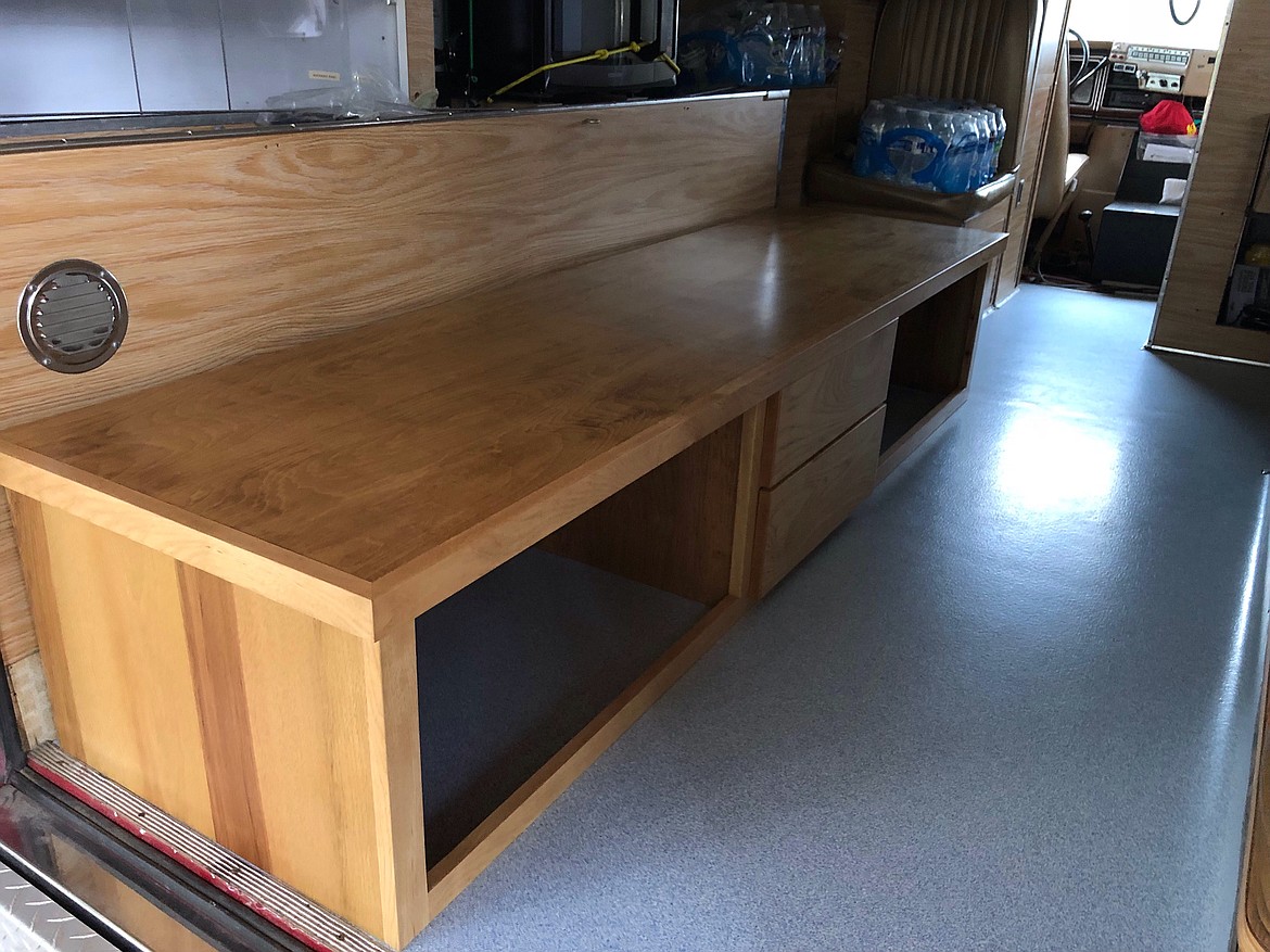 (Courtesy Photo)
Charles and Don, and the crew at Cabinets Northwest built a beautiful cabinet bench for the interior. Angel 1 can now store more supplies and provide more seating for people to get out of the weather.