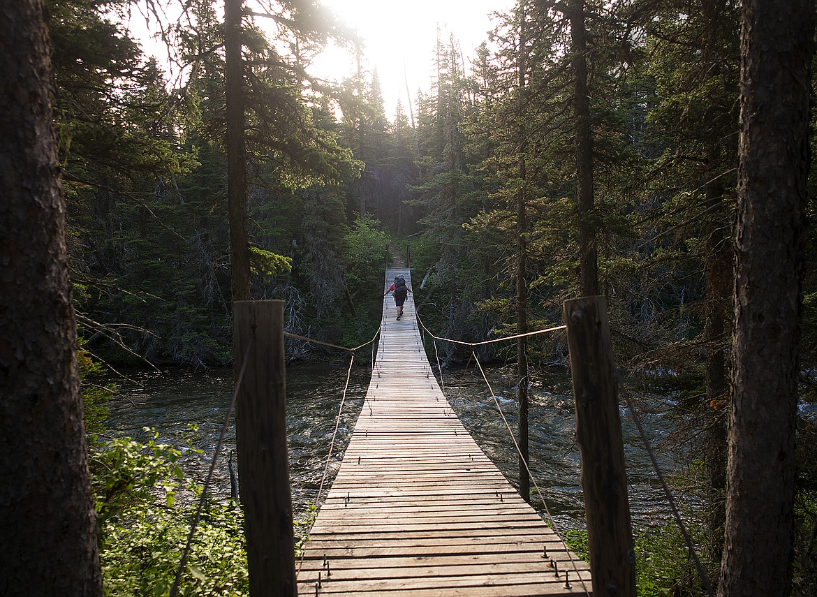 Crossing the Belly River at sunrise.