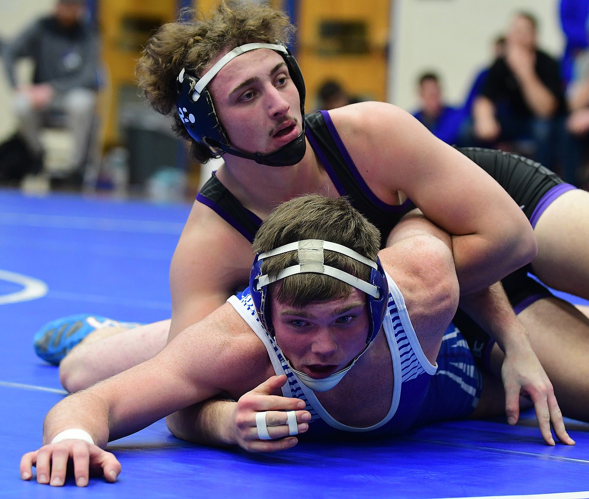 Hunter Fritsch of Polson works against Sam Despain of Columbia Falls during the Tuesday, Dec. 18 dual. Fritsch won by second-period fall in 3:36. (Jeremy Weber/Hungry Horse News)