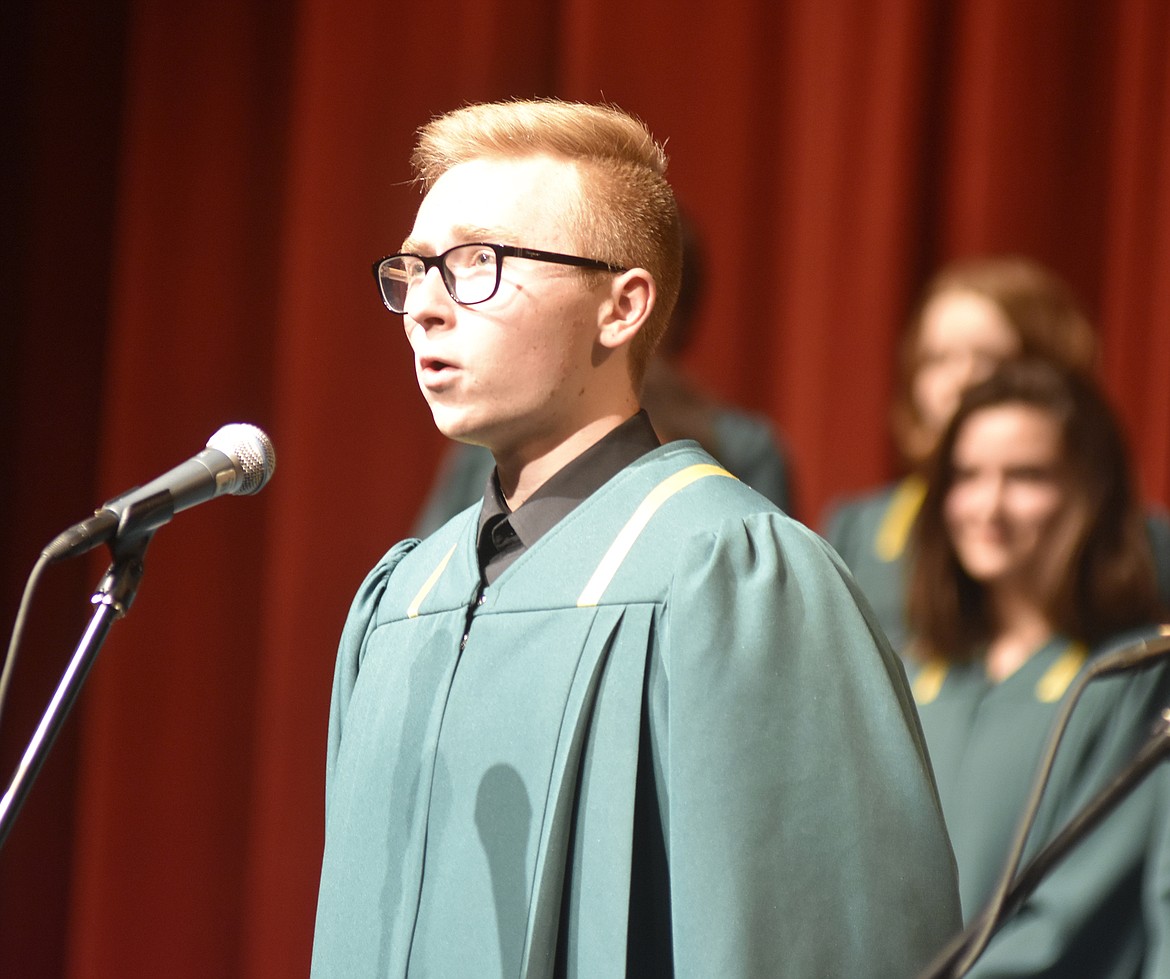 Tenor Josiah Holien sings a solo during &#147;The Christmas Song&#148; during the Whitefish High School choir concert last week at the Whitefish Performing Arts Center . (Heidi Desch/Whitefish Pilot)