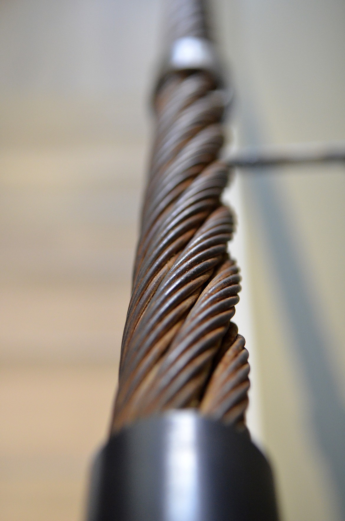 The handrail to the second floor was made from ski lift cable from the old Chair 2 at Whitefish Mountain Resort. The idea for that piece of the design was among several touches the local crew from Malmquist Construction and Timber Forge Design that became part of the house. (Heidi Desch/Whitefish Pilot)