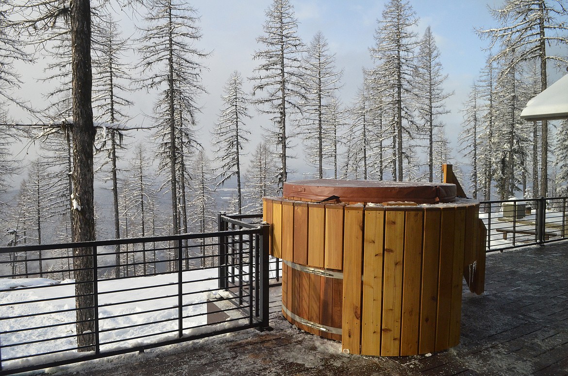 The Scandinavian-style barrel hot tub was assembled on site and on the deck offers relaxation while taking in the views down to Whitefish Lake.  (Heidi Desch/Whitefish Pilot)