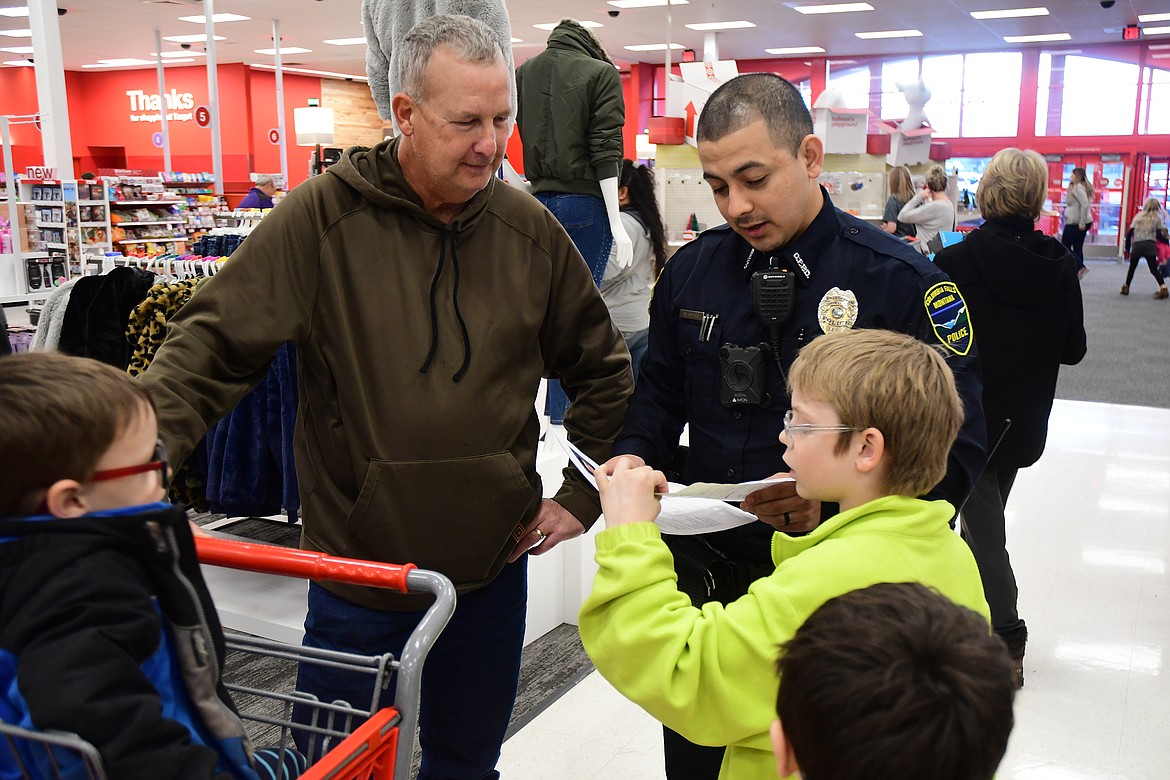 Former officer Gary Stanberry, Officer Rafael Reyes and J.J. Bagwell (in blue), Colby Cobb (head at bottom), Dominick Holwuttle (green).