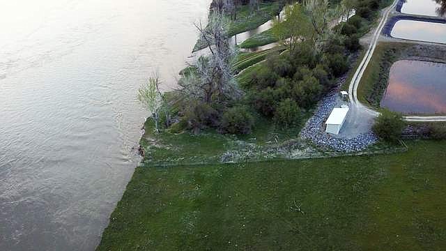 This is an aerial view of the Plains wastewater treatment lagoons that are under siege due to a Clark Fork River erosion issue. (Photo courtesy of Plains-Paradise Ruran Fire Department)