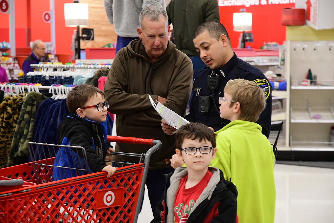 Former officer Gary Stanberry, Officer Rafael Reyes and J.J. Bagwell (in blue), Colby Cobb (in red), Dominick Holwuttle (green)