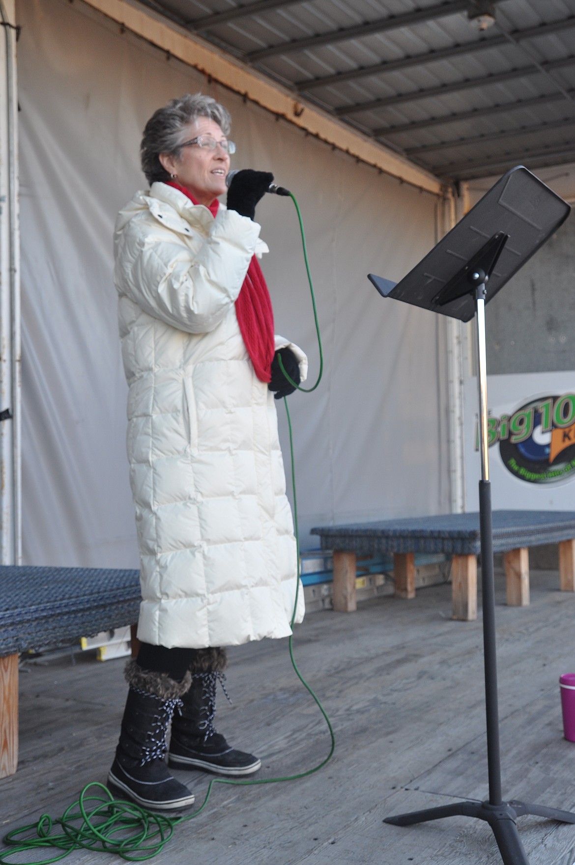 Becky Riebe, of Polson, sings &#147;O Holy Night&#148; during the Polson Business Community Holiday Raffle downtown over the weekend. (Ashley Fox/Lake County Leader)