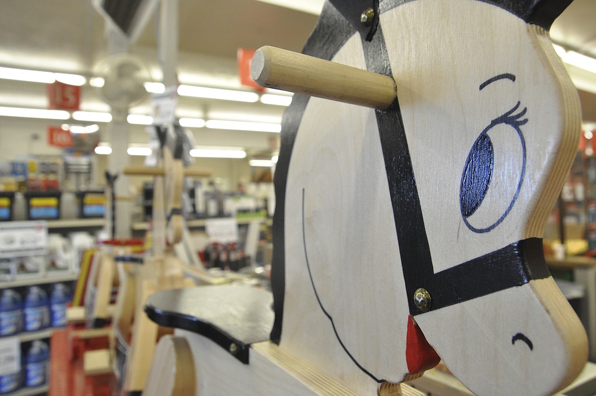 Art students from Polson High School helped paint rocking horses that will be distributed for Christmas to culminate the Marines&#146; Toys for Tots drive. (Ashley Fox/Lake County Leader)