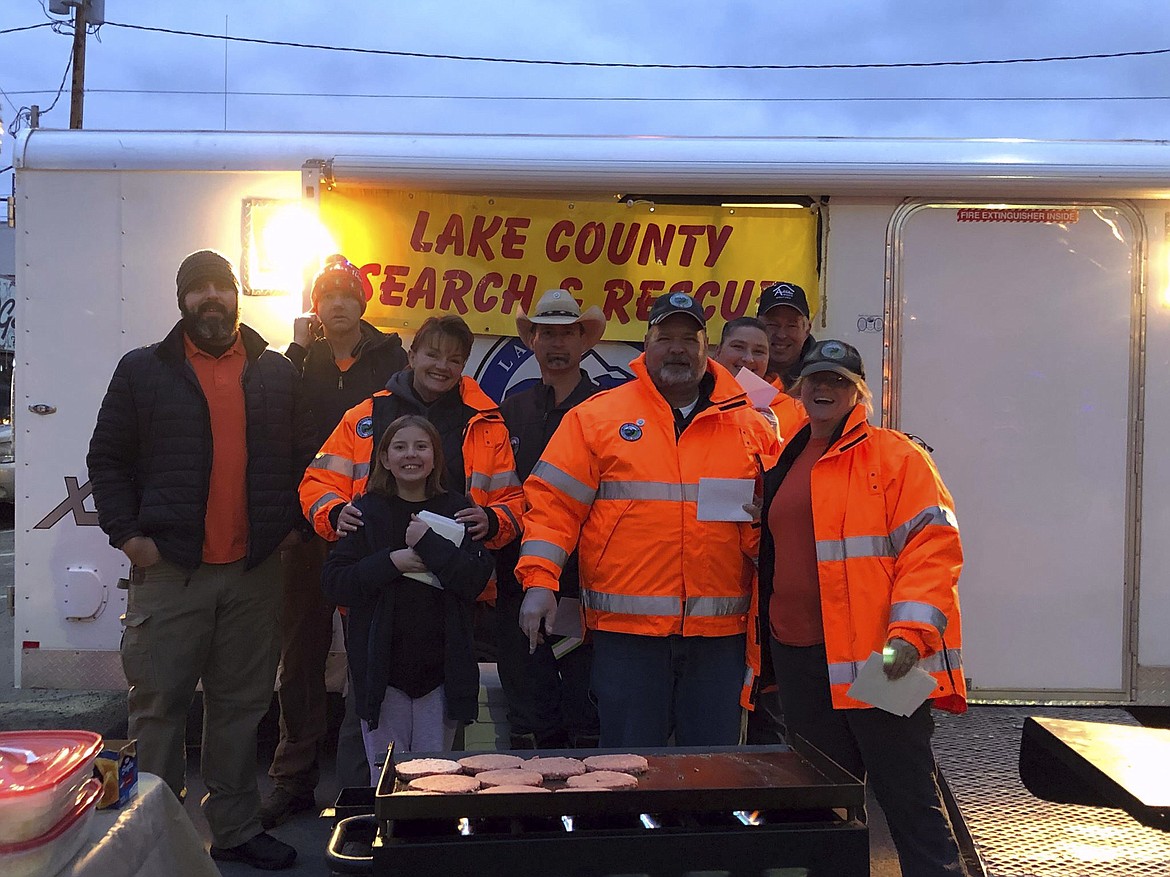 Lake County Search and Rescue volunteers were hand-delivered cards from Charlotte Kinnamon during a recent barbecue fundraiser for the organization. (Photo courtesy of Cassey Kinnamon) Lake County