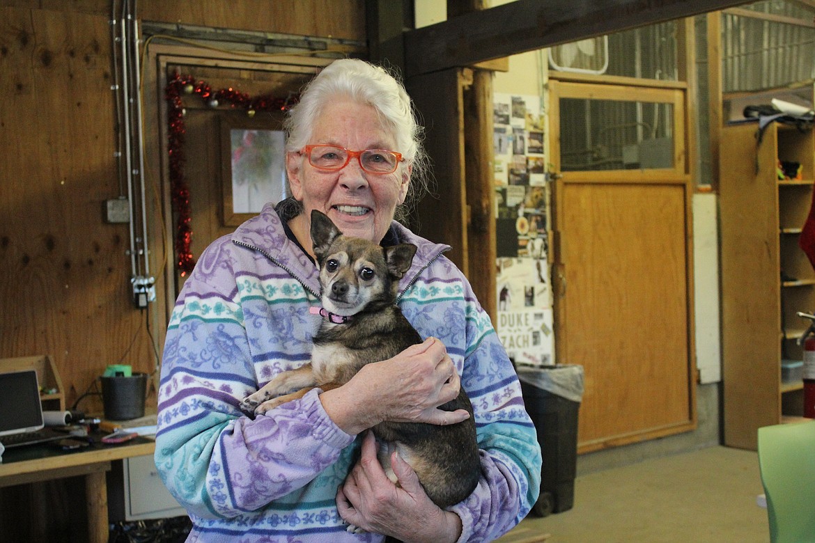 Judy Voth found her new dog Dakota at the academy&#146;s adoption event.