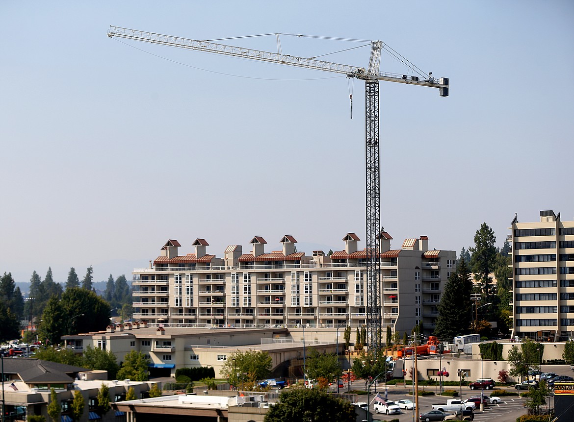 A construction crane towers over the Coeur d'Alene skyline as construction continues on the Lakeside One high rise project in August 2018. (LOREN BENOIT/Press File)