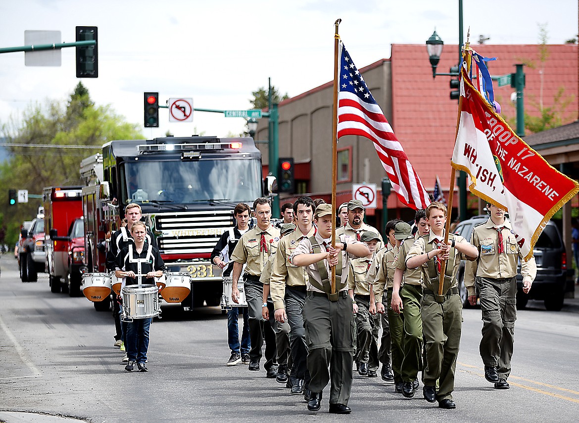 Boy Scout Troop 17 marches down Second Street in downtown Whitefish as part of the Memorial Day parade on Monday afternoon, May 25, 2015.(Brenda Ahearn/Daily Inter Lake)