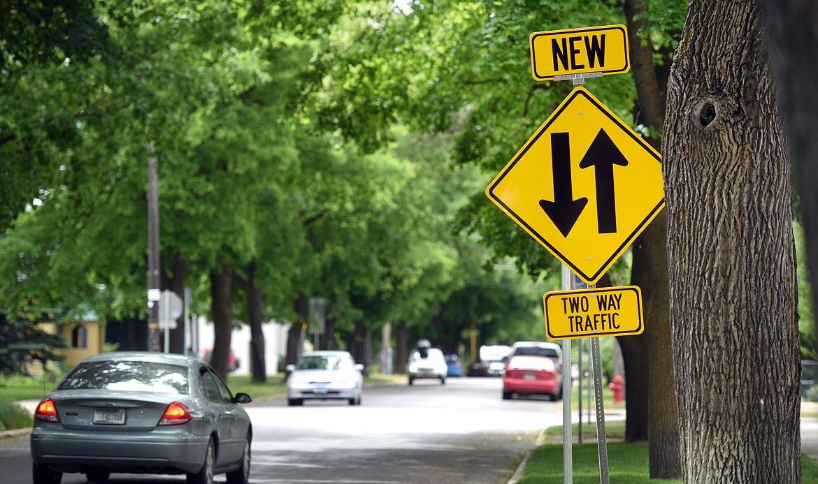 traffic signs on Third Avenue in Kalispell advise drivers of the change of status for the road. Formerly a one-way road heading south, the street has been opened to two-way traffic in this June 2, 2017 file photo. (Brenda Ahearn/Daily Inter Lake)