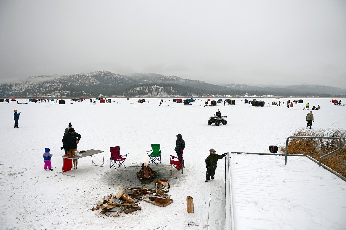 Ice fishing tents and shelters are scattered around Smith Lake at the Sunriser Lions ice fishing derby on Saturday. (Casey Kreider/Daily Inter Lake)