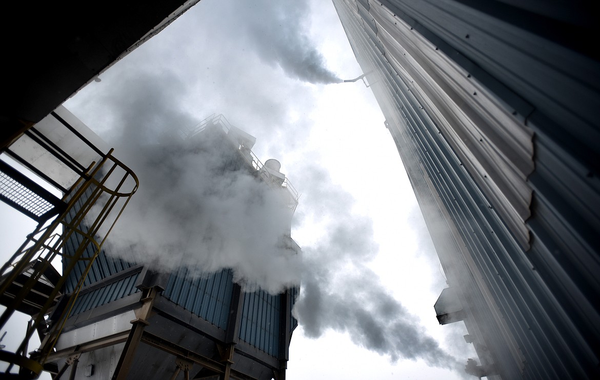 The cold air makes the steam produced at F.H. Stotlze Lumber Company visible on December 10, in Columbia Falls.(Brenda Ahearn/Daily Inter Lake)