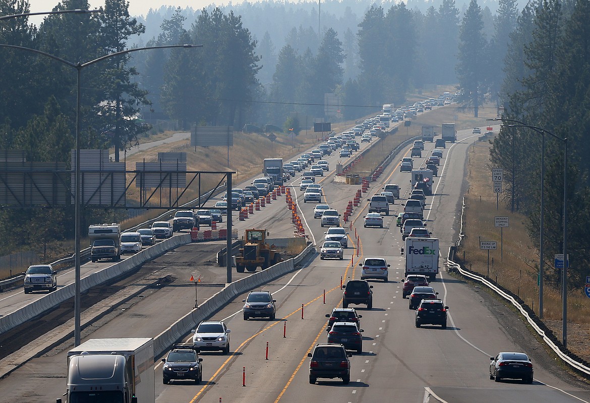 Motorists headed eastbound negotiate the through lane and the Northwest Boulevard exit on Interstate 90 in August. The freeway was reconstructed in both directions from Northwest Boulevard to Ninth Street this year.