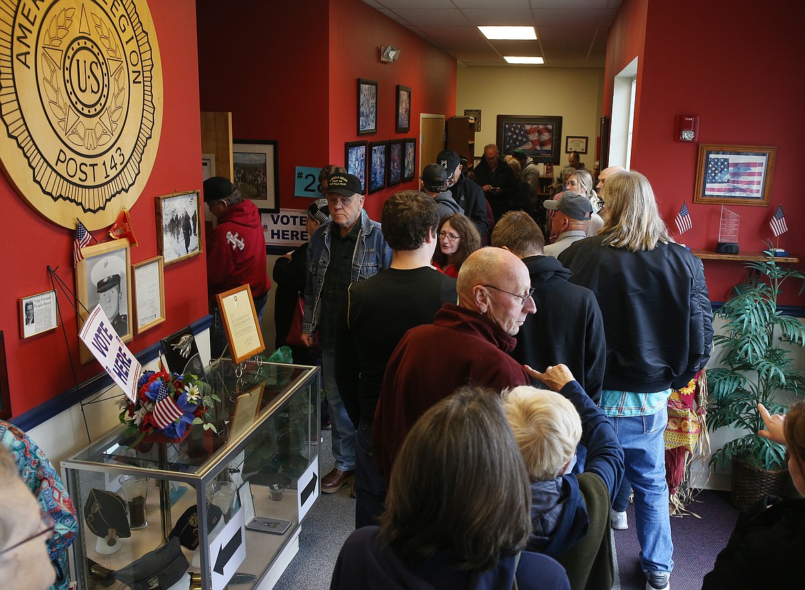 Voters in precinct 28 wait in line at American Legion Post 143 in Post Falls to cast their 2018 mid-term General Election ballots. (LOREN BENOIT/Press File)