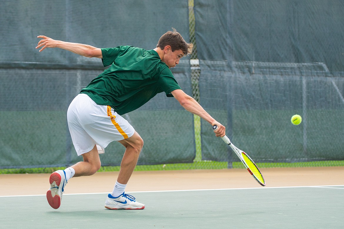 Eric Holdhusen reaches out during a match against Columbia Falls last Thursday.