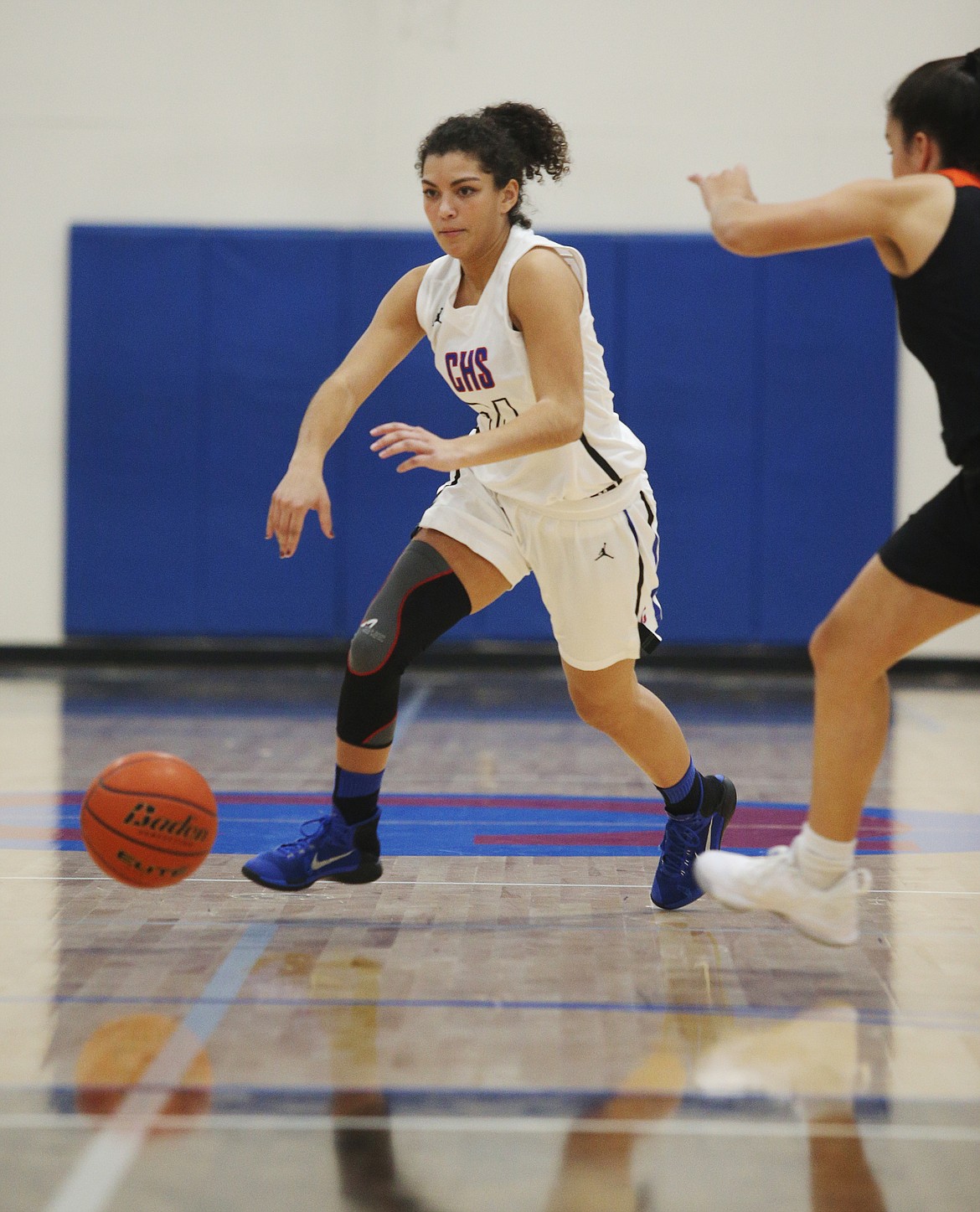 Coeur d&#146;Alene guard Halle Kane dribbles the ball down the court during Tuesday night&#146;s game against Post Falls High. (LOREN BENOIT/Press)