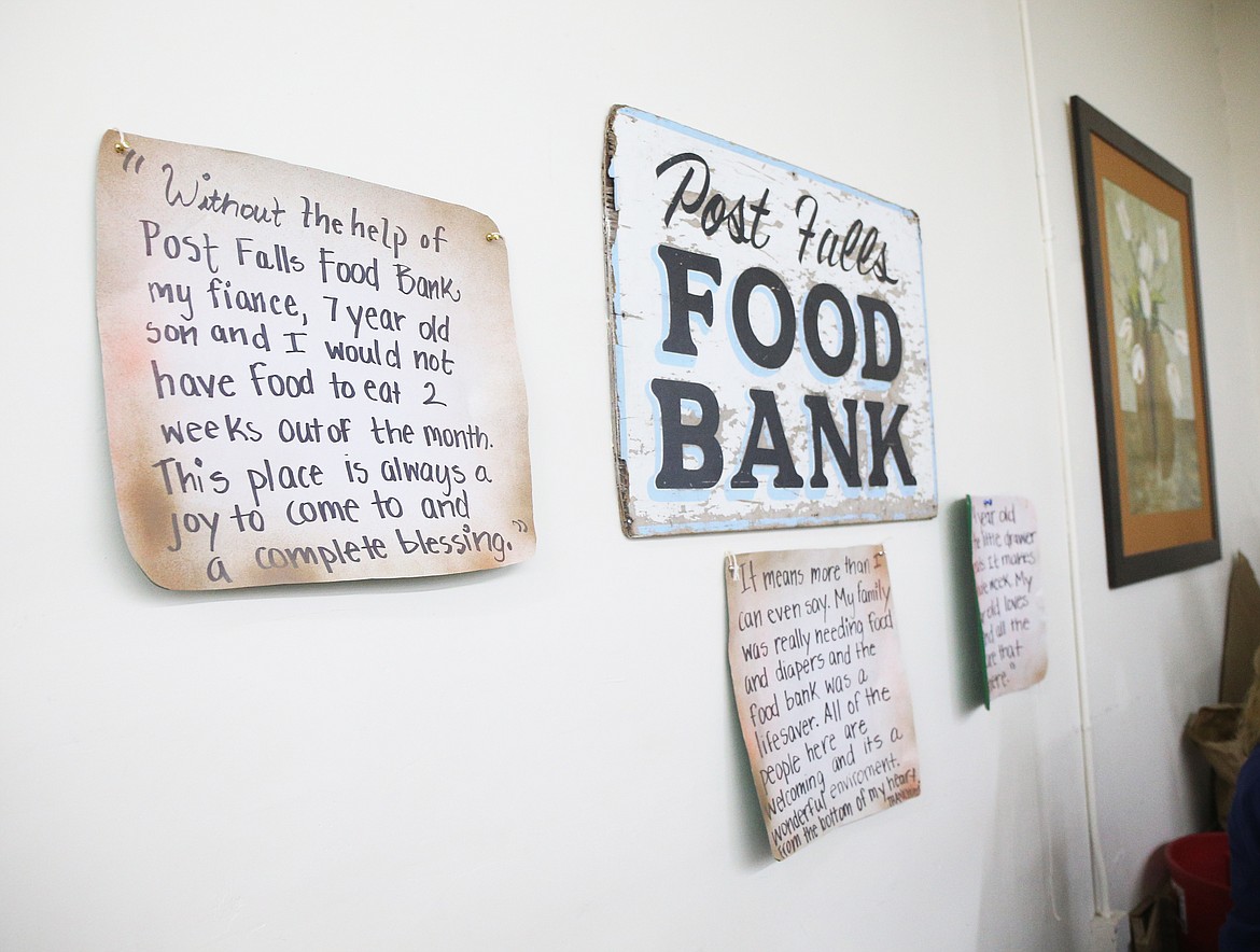 Kind notes of gratitude from guests are displayed on one of the walls of the Post Falls Food Bank.  (LOREN BENOIT/Press)