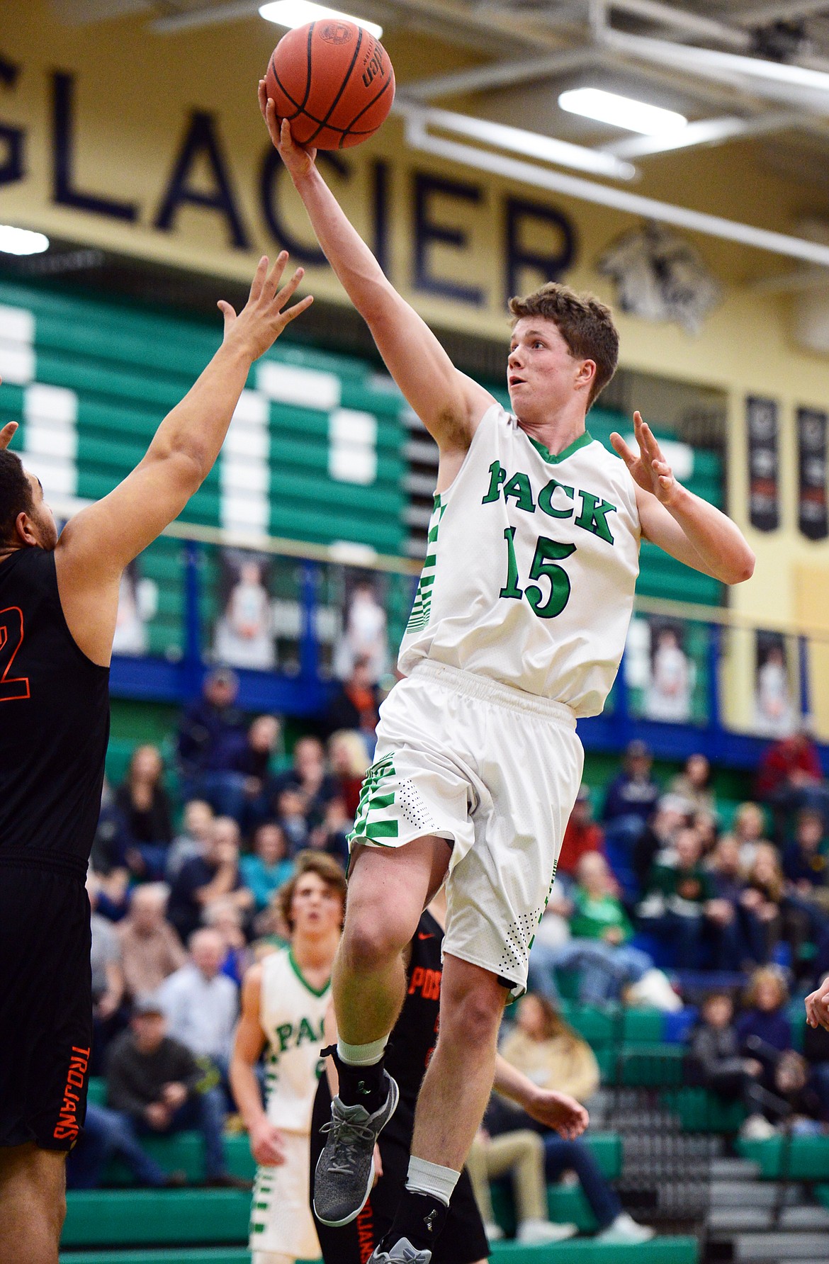 Glacier's Drew Engellant (15) drives to the hoop in the first half against Post Falls at Glacier High School on Friday. (Casey Kreider/Daily Inter Lake)