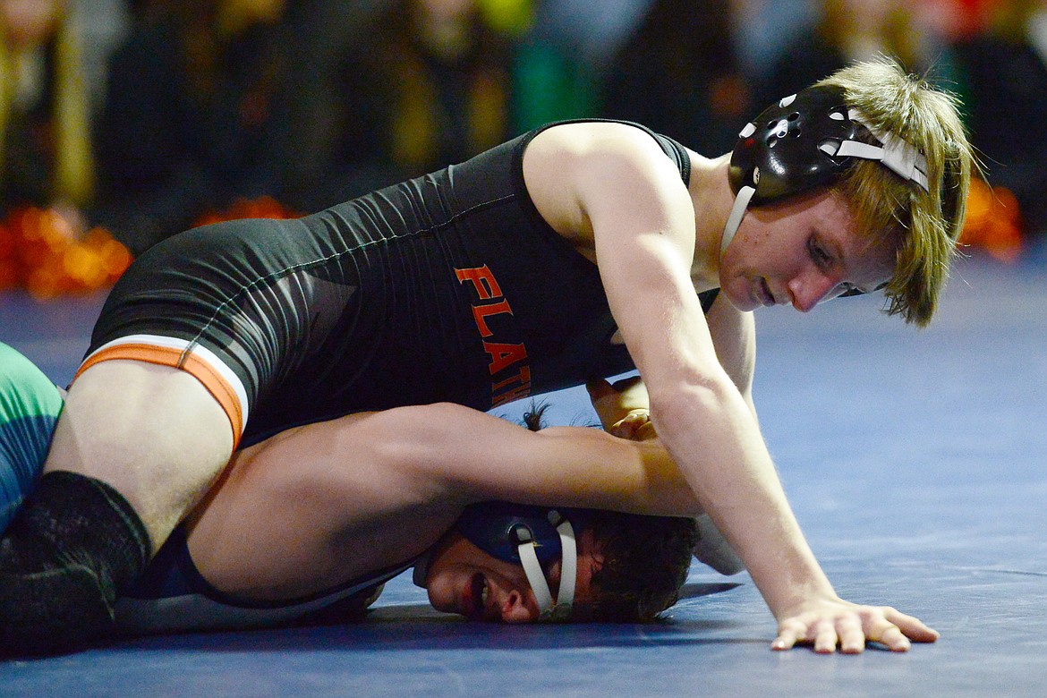 Flathead's Cole Eastwood wrestles Glacier's Thomas Putnam at 103 lbs. during a crosstown matchup at Glacier High School on Thursday. (Casey Kreider/Daily Inter Lake)