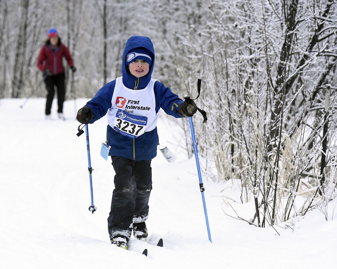 Logan Radley, 6, of Missoula skies in the 3K classic race at the annual Glacier Glide on Sunday at the Dog Creek Lodge and Nordic Center in Olney. (Heidi Desch/Whitefish Pilot)